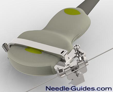 A needle guide mounted on a convex ultrasound transducer.